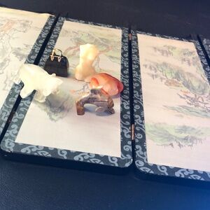 elephant, purse, bust, heart, and dolphin